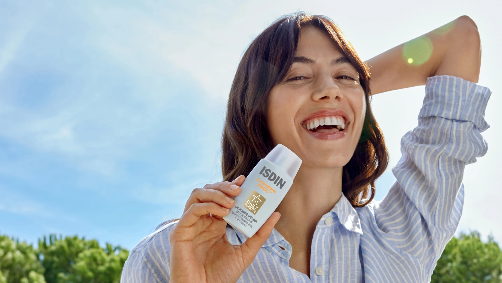 Woman holding Fusion Water Magic