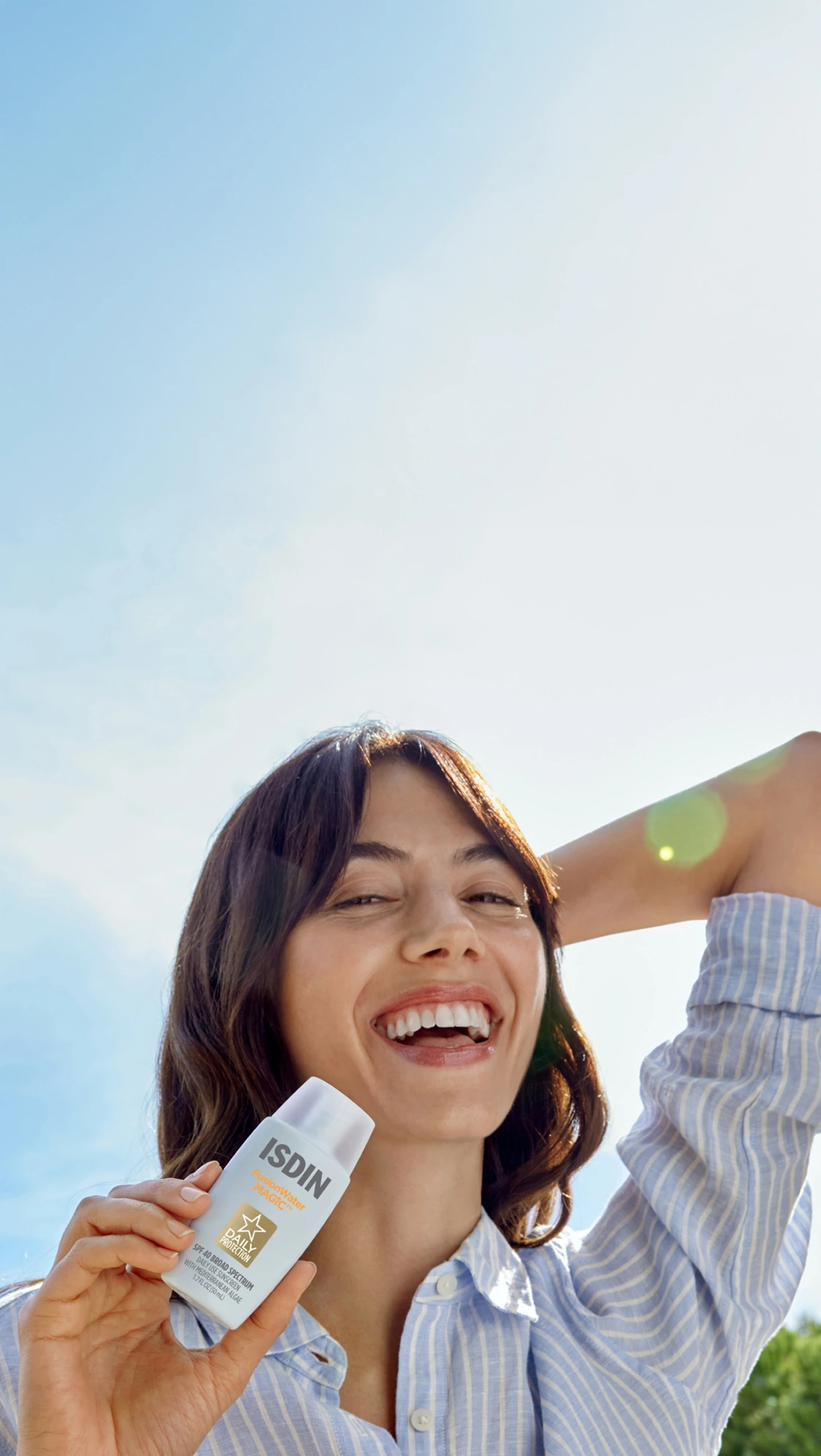 Woman holding Fusion Water Magic